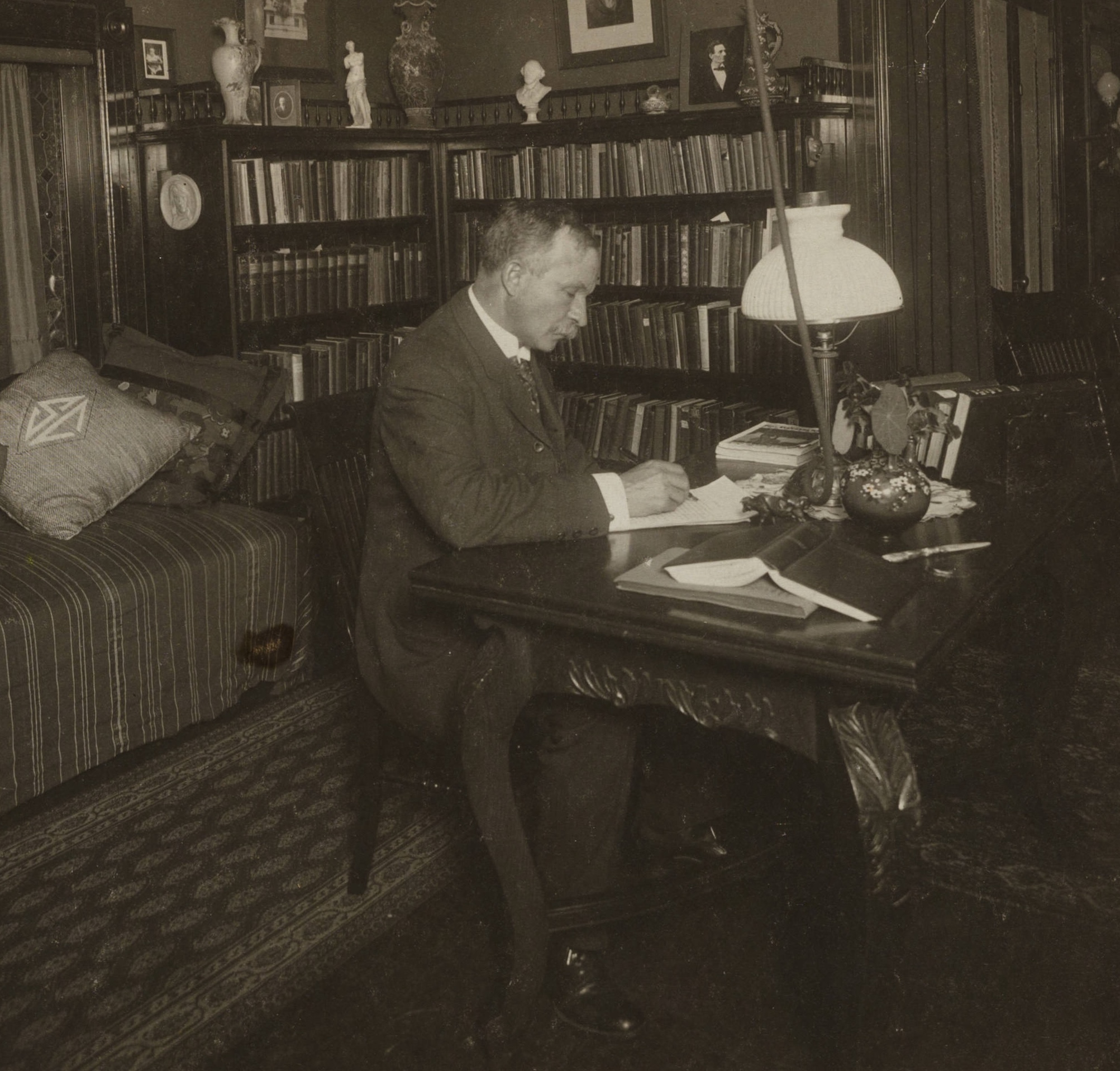Detail from Photograph of C.W. Chesnutt in his library, public domain
